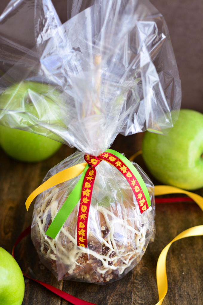 Caramel Apple packed up in cellophane and tied with ribbon.